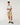 Full-length: Rip Curl Men's Classic Surf Weaver Shirt in Bone, full-length model view styled with neutral shorts.