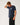 Angled: Rip Curl Men's Sunrise Desto Tee in Dark Navy, angled model view showing chest print and side fit