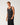 Angled: Rip Curl Men's Disorder Legacy Tank in Washed Black, angled view showing sleeveless cut and side fit