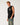 Angled: Rip Curl Men's Disorder Boneyards Muscle in Black, angled view showing open armhole and chest graphic