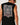 Back detail: Rip Curl Men's Disorder Boneyards Muscle in Black, close-up of crackle-effect back artwork
