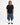 Volcom Men's Spares II Short Sleeve Shirt in Black, full-length styling with blue denim shorts